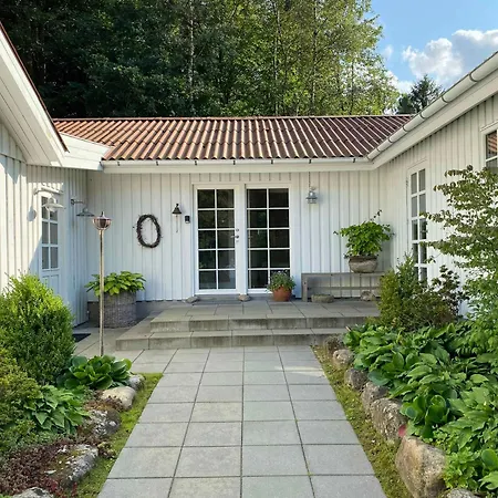 Idyllically Situated Wooden House By The Forest