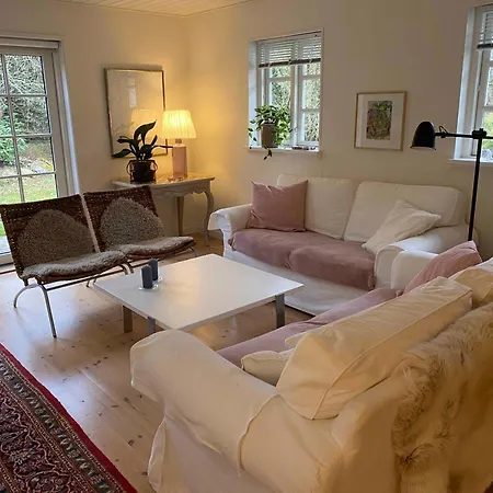 Idyllically Situated Wooden House By The Forest